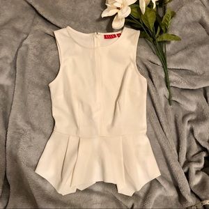 Elle Ruffle Bottom Sleeveless Blouse